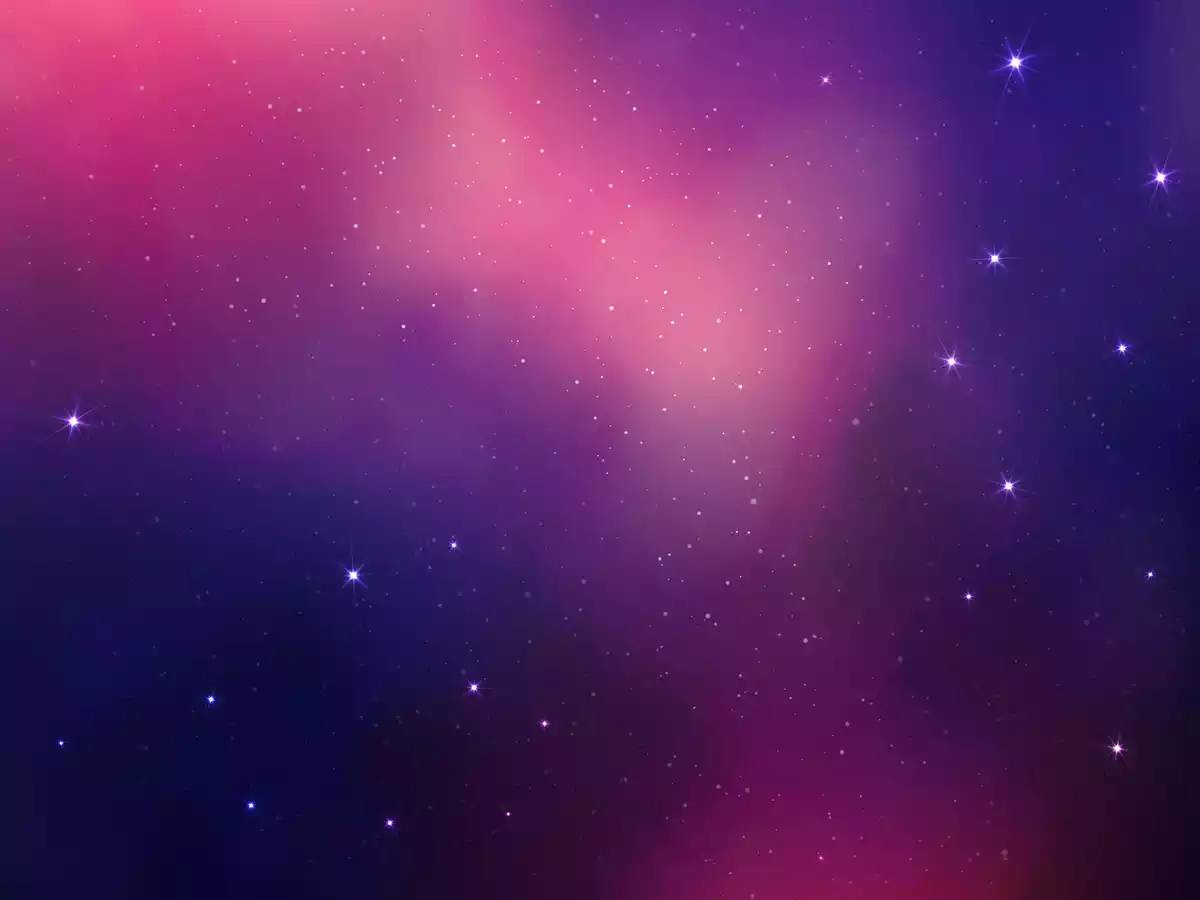 Ciel étoilé avec un halo rose